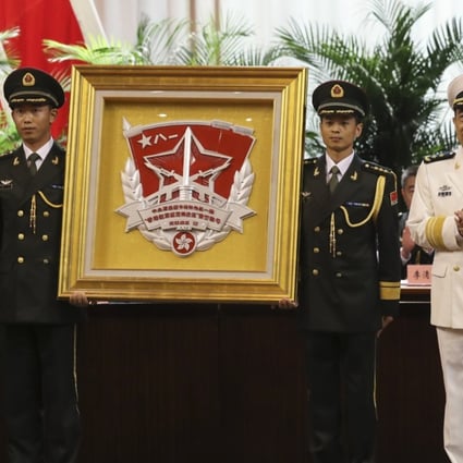 Commander Yuan Yubai (in white uniform) of the Southern Theatre Command is one of the authors of the article. Photo: Edward Wong