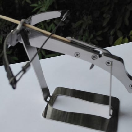 A toothpick crossbow mounted on a stand. Photo: Handout