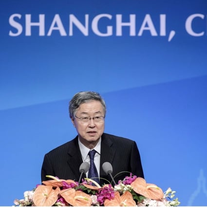 Zhou Xiaochuan, governor of the People’s Bank of China, speaks at the Lujiazui Forum in Shanghai on Tuesday. Photo: Bloomberg