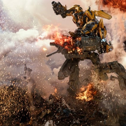 Bumblebee fights off a Sentinel in Transformers: The Last Knight (category: IIA), directed by Michael Bay. The film stars Mark Wahlberg and Anthony Hopkins.