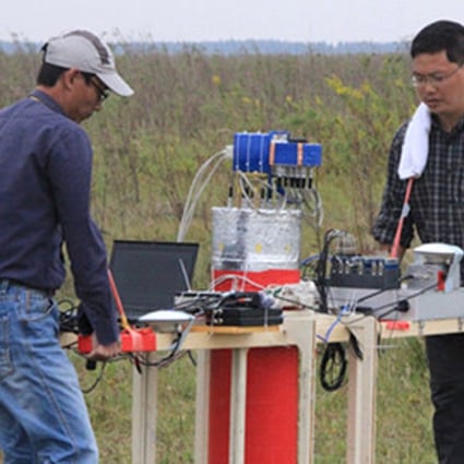 Scientists field test a prototype of a MAD device in this file photo taken in 2014. Photo: Handout