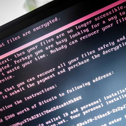A laptop screen displays a message after it was infected with ransomware during a worldwide cyberattack, in Geldrop, the Netherlands, on Tuesday. Photo: EPA