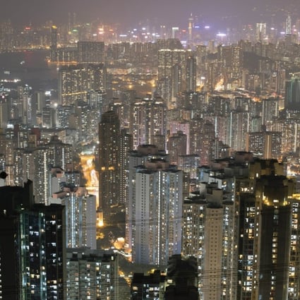 Apartment buildings and office blocks clustered tightly together in Hong Kong's Kowloon district. Home prices in the crowded area of the city have risen by 120 per cent since 2008, and by more than 30 per cent from their previous peak in 1997. Photo: AFP