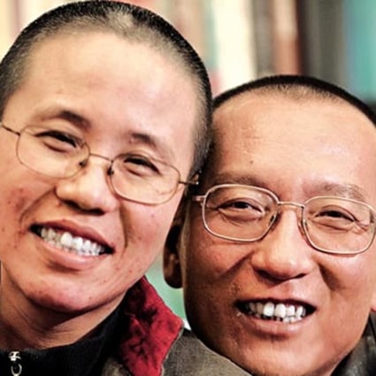 Liu Xiaobo (right) and his wife Liu Xia pictured before his imprisonment on subversion charges. Photo: Reuters