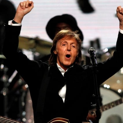 Paul McCartney celebrates after performing with Ringo Starr (not pictured) during the 2015 Rock and Roll Hall of Fame Induction Ceremony in Cleveland, Ohio. McCartney settled a lawsuit against Sony/Atv for the rights to Beatles music. Photo: Reuters