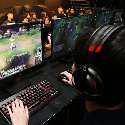 A competitor playing in a League of Legends tournament. Photo: David Wong