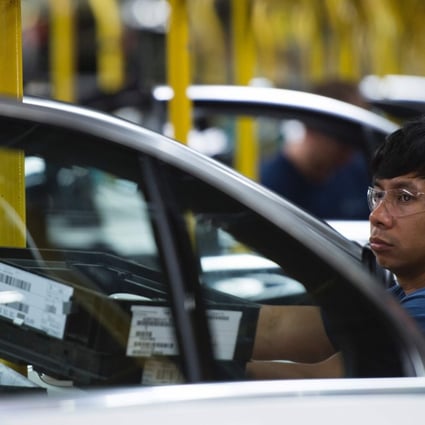 An American worker pictured at a car factory in Alabama run by the German firm Mercedes-Benz. Photo: AFP