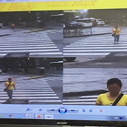 A woman is captured by a new facial recognition system as she crosses the road on a red light in Shanghai. Photo: Handout