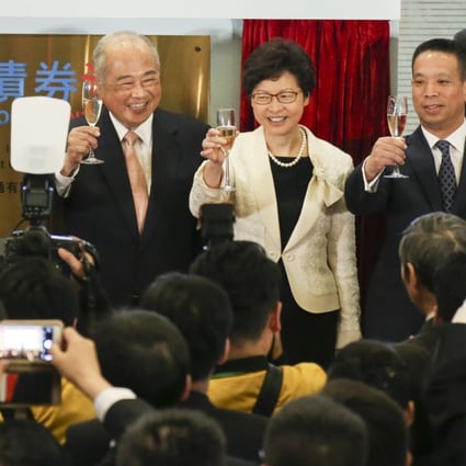 The official launch of the Bond Connect on Monday was attended by Chief Executive Carrie Lam Cheng Yuet-ngor (centre right, and chairman of Hong Kong Exchanges and Clearing Limited, Chow Chung-kong (centre left), among other dignitaries. Photo: Felix Wong