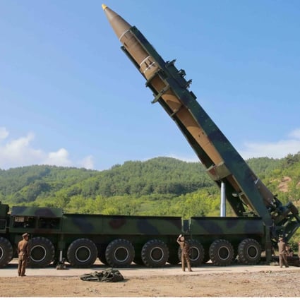 A handout photo made available by the official North Korean Central News Agency (KCNA) shows the North Korean intercontinental ballistic missile Hwasong-14 being prepared before a test launch. Photo: EPA