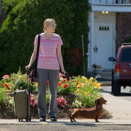 Greta Gerwig with the titular star of Wiener-Dog (category IIB), directed by Todd Solondz and also starring Keaton Nigel Cooke, Danny DeVito and Ellen Burstyn.