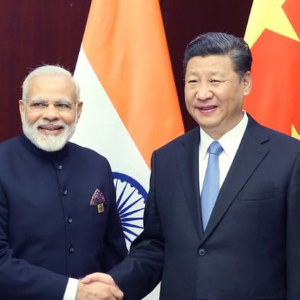 Chinese President Xi Jinping (right) meets with Indian Prime Minister Narendra Modi in Astana, Kazakhstan. Photo: Xinhua