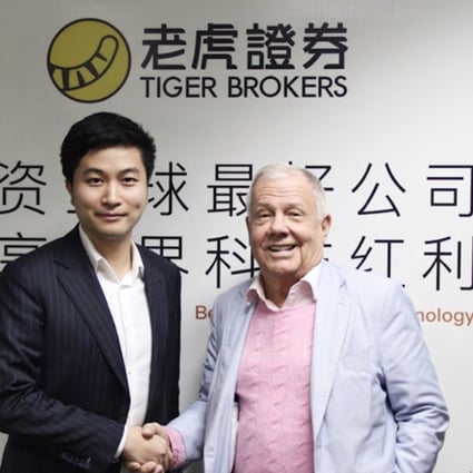 Tiger Brokers’ chief executive Wu Tianhua (left) and US investment guru Jim Rogers. Photo: Handout