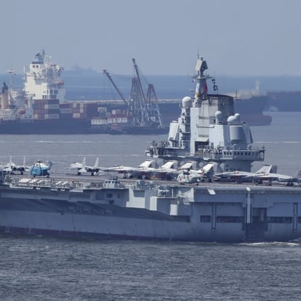 The Liaoning pictured leaving Hong Kong waters on Tuesday. Photo: Roy Issa