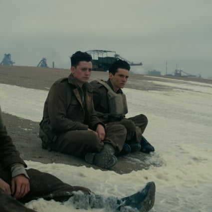 From left: Harry Styles, Aneurin Barnard and Fionn Whitehead in the film Dunkirk, written and directed by Christopher Nolan.
