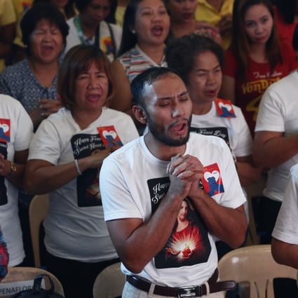 Filipinos gather for an inter-faith prayer service in Quezon City, east of Manila, Philippines. The interfaith prayer service, carried the message of peace, unity and safety from foreign invasion and terrorism. Photo: EPA