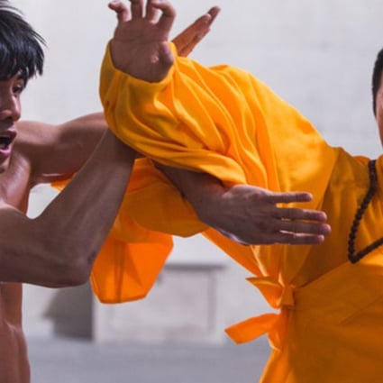 Philip Ng as Bruce Lee and Xia Yu as Wong Jack Man in Birth of the Dragon.
