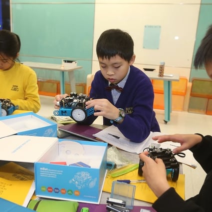Students of Baptist Lui Ming Choi Primary School get STEM and robotics training in Sha Tin. Trained young talents can boost network security as cyber crime spreads. Photo: K.Y. Cheng