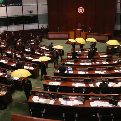 Another protest in the Legislative Council chamber. Photo: David Wong