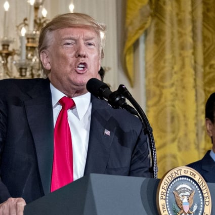 U.S. President Donald Trump speaks as billionaire Terry Gou, chairman of Foxconn Technology Group, right, listens during an event in the East Room of the White House in Washington, D.C., U.S., on Wednesday, July 26, 2017. Trump announced that Foxconn Technology Group plans a new factory in Wisconsin, fulfilling the Taiwanese manufacturing giants promise to invest in the U.S. Photographer: Andrew Harrer/Bloomberg