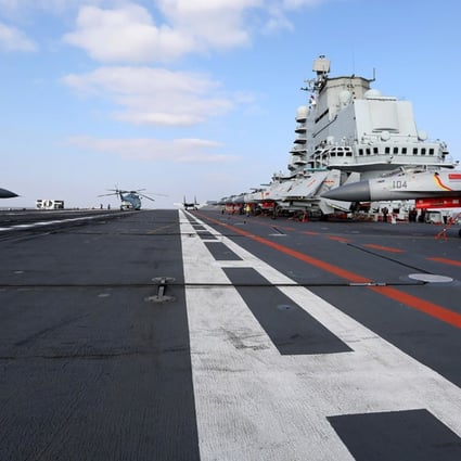 Chinese J-15 fighter jets on the deck of the Liaoning aircraft carrier during military drills in the Yellow Sea in December. Photo: AFP