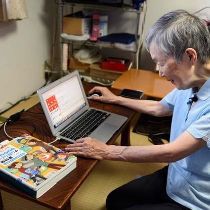 Masako Wakamiya use her laptop in her home in Fujisawa. Photo: AFP