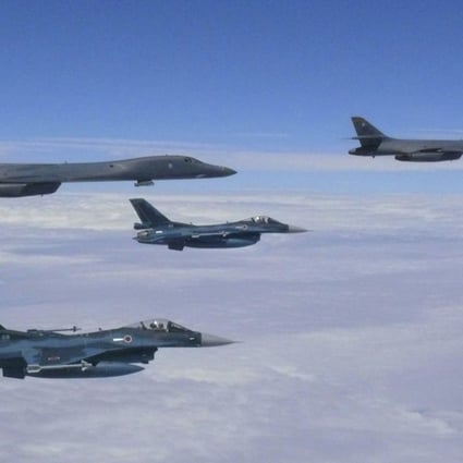 Japanese fighter jets fly with the US Air Force B-1B Lancer bombers over Japan's southern island of Kyushu during their joint exercise. Photo: AP