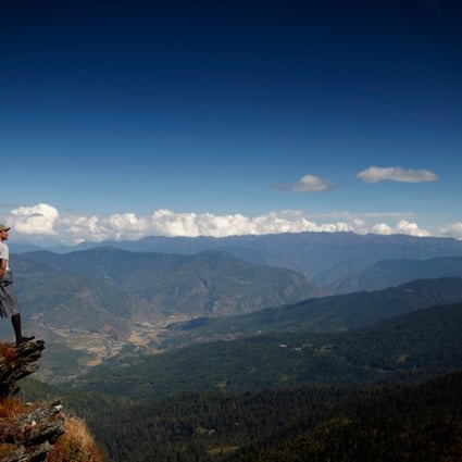 A man looks towards the Paro valley, near the Chele La pass situated between the Bhutanese valleys of Paro and Haa. Many in the Indian media and officials have been propagating a misleading message that Bhutan is a “protectorate” of India. Bhutan has never been a “protectorate”. Photo: AFP