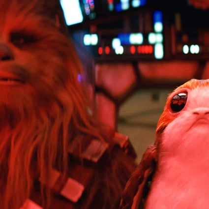 Chewbacca (Joonas Suotamo) and a Porg in a still from Star Wars: The Last Jedi first released by Entertainment Weekly. Photo: ILM/2017 Lucasfilm Ltd