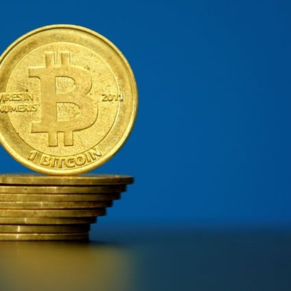 Bitcoin (virtual currency) coins are seen in an illustration picture taken at La Maison du Bitcoin in Paris, France. Photo: Reuters
