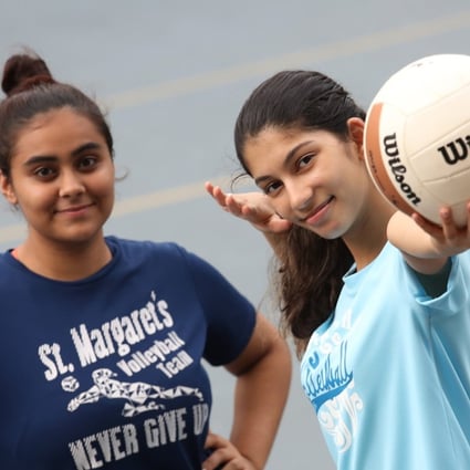 Volunteer coaches Drishti Melwani (left) and Naina Mishra focus on participants’ enjoyment. Photo: Nora Tam