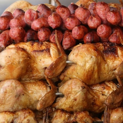 Chickens and sausages on display at a steakhouse in Rio de Janeiro. Photo: EPA
