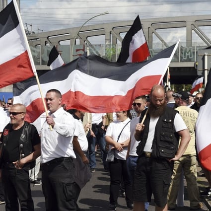 Far-right groups gather to commemorate the death of Adolf Hitler's deputy, Rudolf Hess, in Berlin's western district of Spandau. Photo: AP