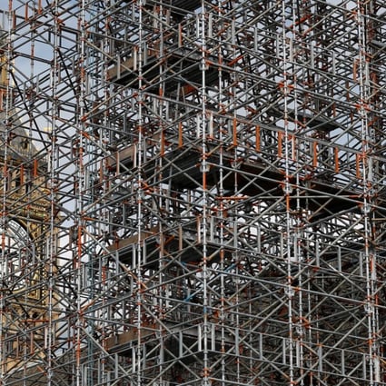 Scaffolding stands in front of the Queen Elizabeth Tower, which houses the clock and the Big Ben bell, at the Houses of Parliament in London. Photo: Reuters