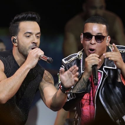Singers Luis Fonsi, left, and Daddy Yankee during the Latin Billboard Awards in Florida. In a landmark moment for Latin music in the US, their hit “Despacito” spent its 16th week on top of the charts in the United States. Photo: AP