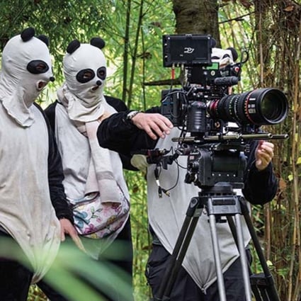 Cinematographer Paul Stewart and his assistants at the shoot for Born in China. Photo: Wang Zhide