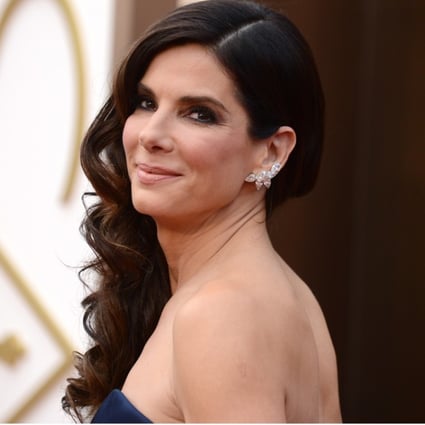 Sandra Bullock arrives at the Oscars at the Dolby Theatre, in Los Angeles. Photo: Jordan Strauss/AP
