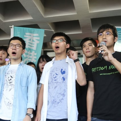 Pro-democracy activists (from left) Nathan Law, Joshua Wong and Alex Chow ahead of their sentencing, at the High Court on August 17. Photo: Edward Wong