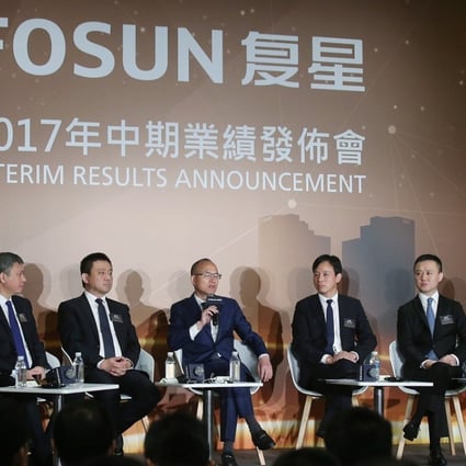Fosun’s top management at its 2017 interim results presentation in Hong Kong last month. The company has faced scrutiny from mainland authorities over its aggressive overseas acquisitions. Photo: K.Y. Cheng