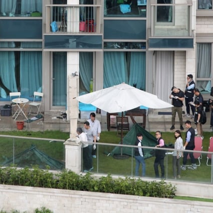 The couple fell down onto the patios of fifth-floor flats. Photo: Sam Tsang