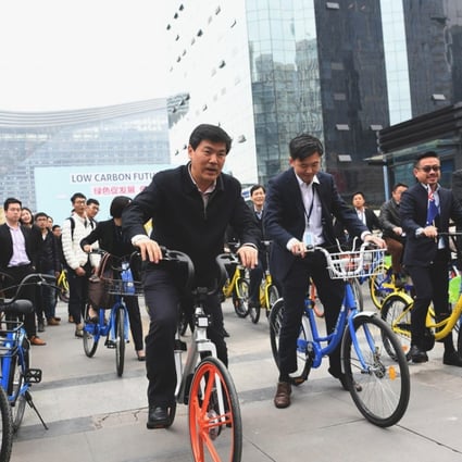 Chengdu city officials at the launch of a bike-sharing scheme in the city – which is trying to improve its green credentials. Photo: ImagineChina