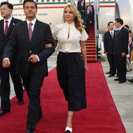 Mexican President Enrique Pena Nieto arrives in Xiamen, Fujian, on Monday with his wife. The president will attend the Dialogue of Emerging Markets and Developing Countries on the sidelines of the BRICS summit. Photo: Xinhua