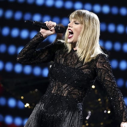 Taylor Swift performs in Houston. Her single ended the 16-week reign at the top of US charts by Despacito. Photo: AP