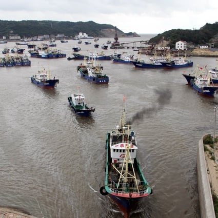 Boats take shelter in a channel near Songmen, in the city of Wenling, Zhejiang province on Tuesday. Typhoon Talim is expected to make landfall on Thursday or Friday. Photo: Xinhua
