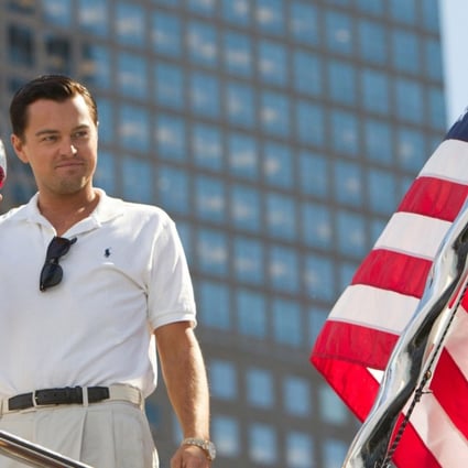 A still from the film The Wolf of Wall Street shows actor Leonardo DiCaprio playing the role of Jordan Belfort. Producers of the film, Red Granite Pictures have reached a settlement with US prosecutors over assets allegedly bought with money stolen from a Malaysian state fund. Photo: AP