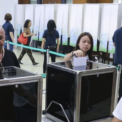 Citizens in Macau cast their ballots on Sunday. Photo: Dickson Lee