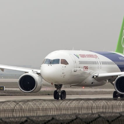 A Comac C919 aircraft taxis after landing at Pudong International Airport in Shanghai on May 5, 2017. Photo: Bloomberg