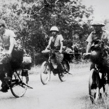Bike-riding Japanese soldiers in Malaya, during the second world war.