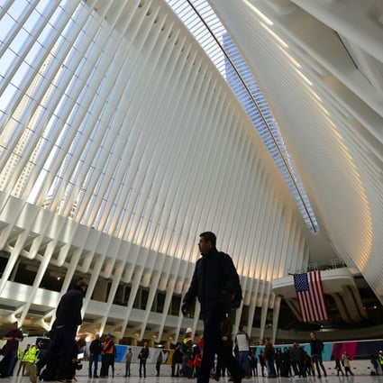 The median Manhattan rent was US$3,377 in August, up 0.5 per cent from August 2016. People walk through the new World Trade Center transportation hub in New York. Photo: Xinhua