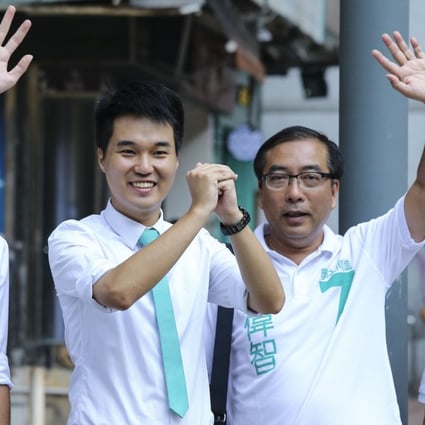 Sulu Sou Ka-hou (second left) celebrates on Monday after winning a seat in the Macau Legislative Assembly election. Photo: Dickson Lee